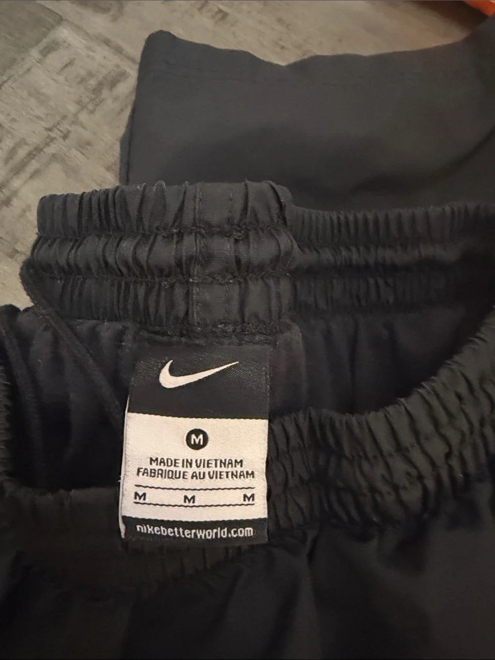 Nike Black Lined Joggers with White Side Stripes - women size medium